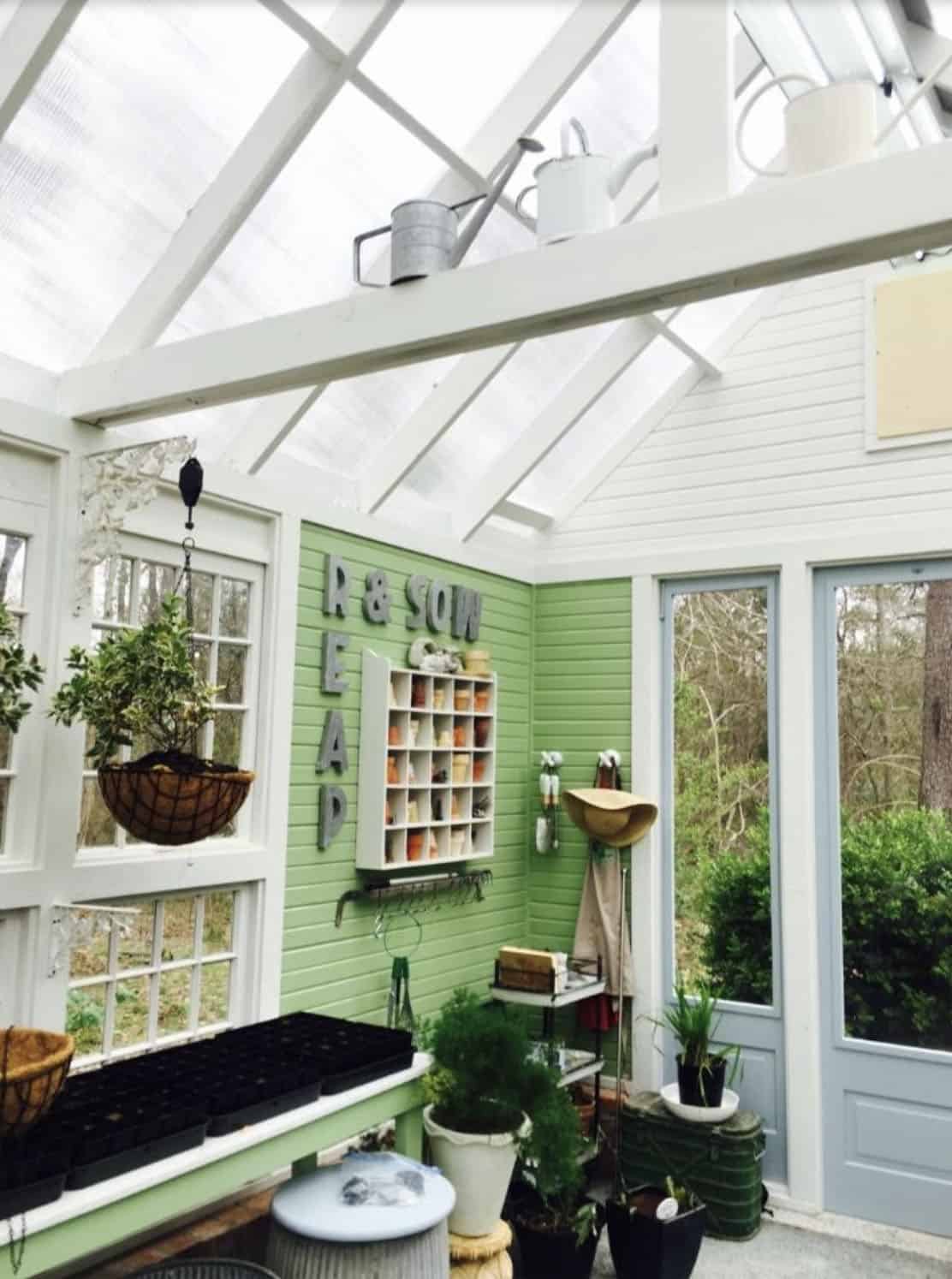 greenhouse with a pitched roof and potting area