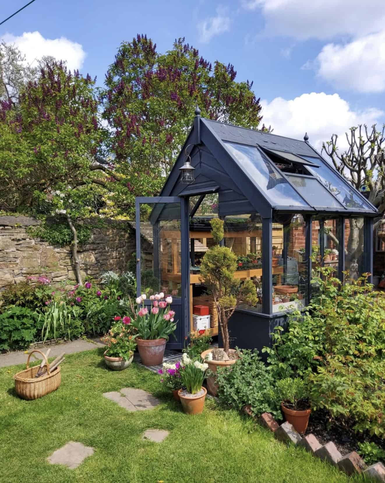 greenhouse exterior surrounded by gardens