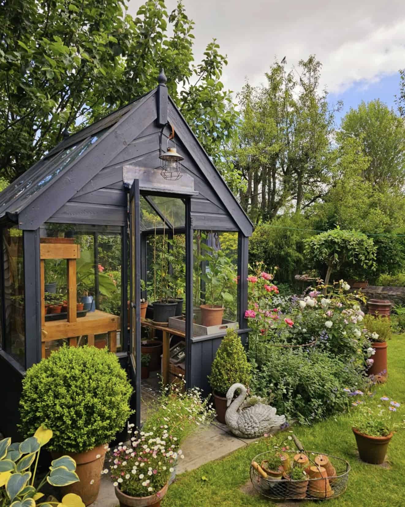 greenhouse exterior surrounded by gardens