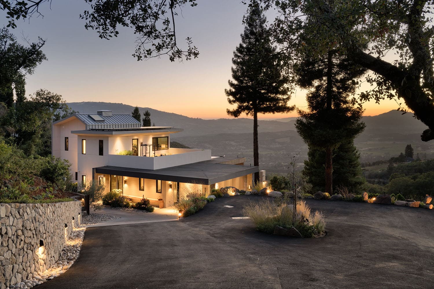 modern ranch house exterior at dusk