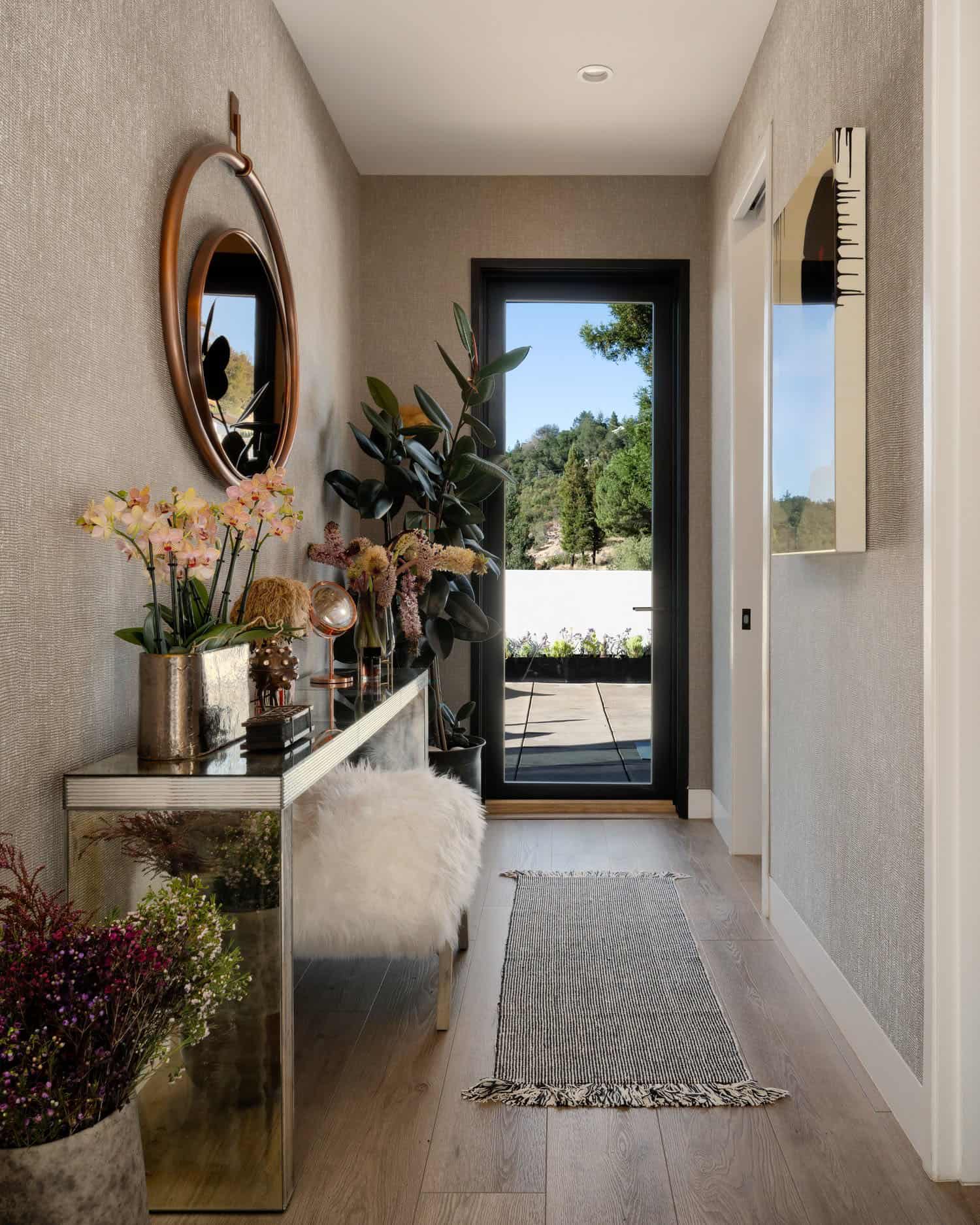 modern ranch house entry with a console table