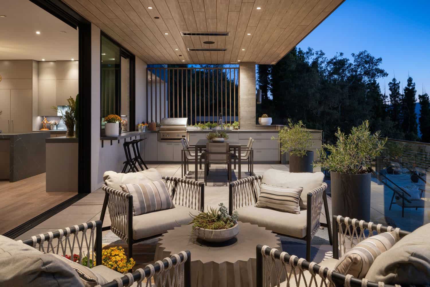 modern ranch house exterior covered patio with outdoor furniture