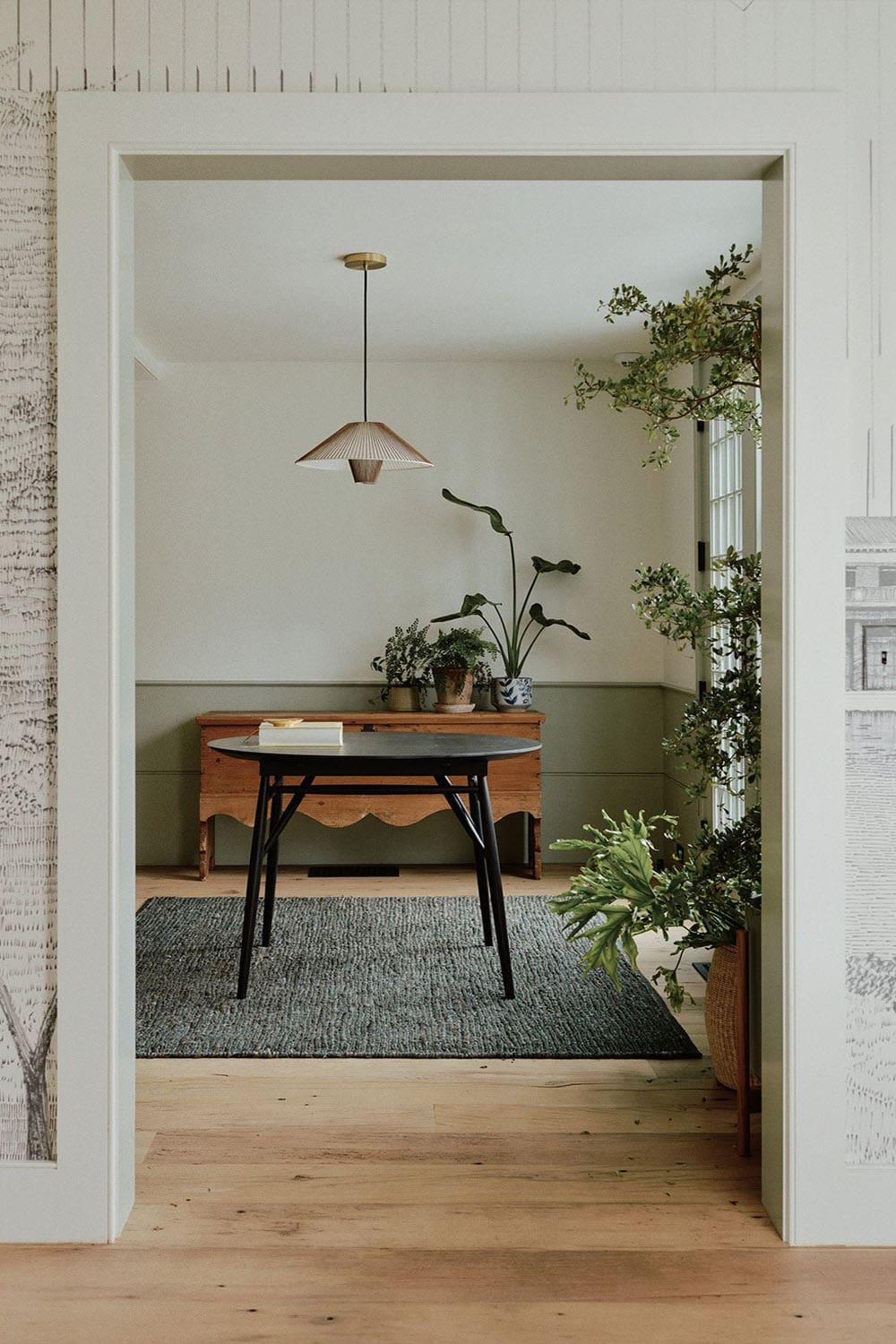 farmhouse style home entry with a round table