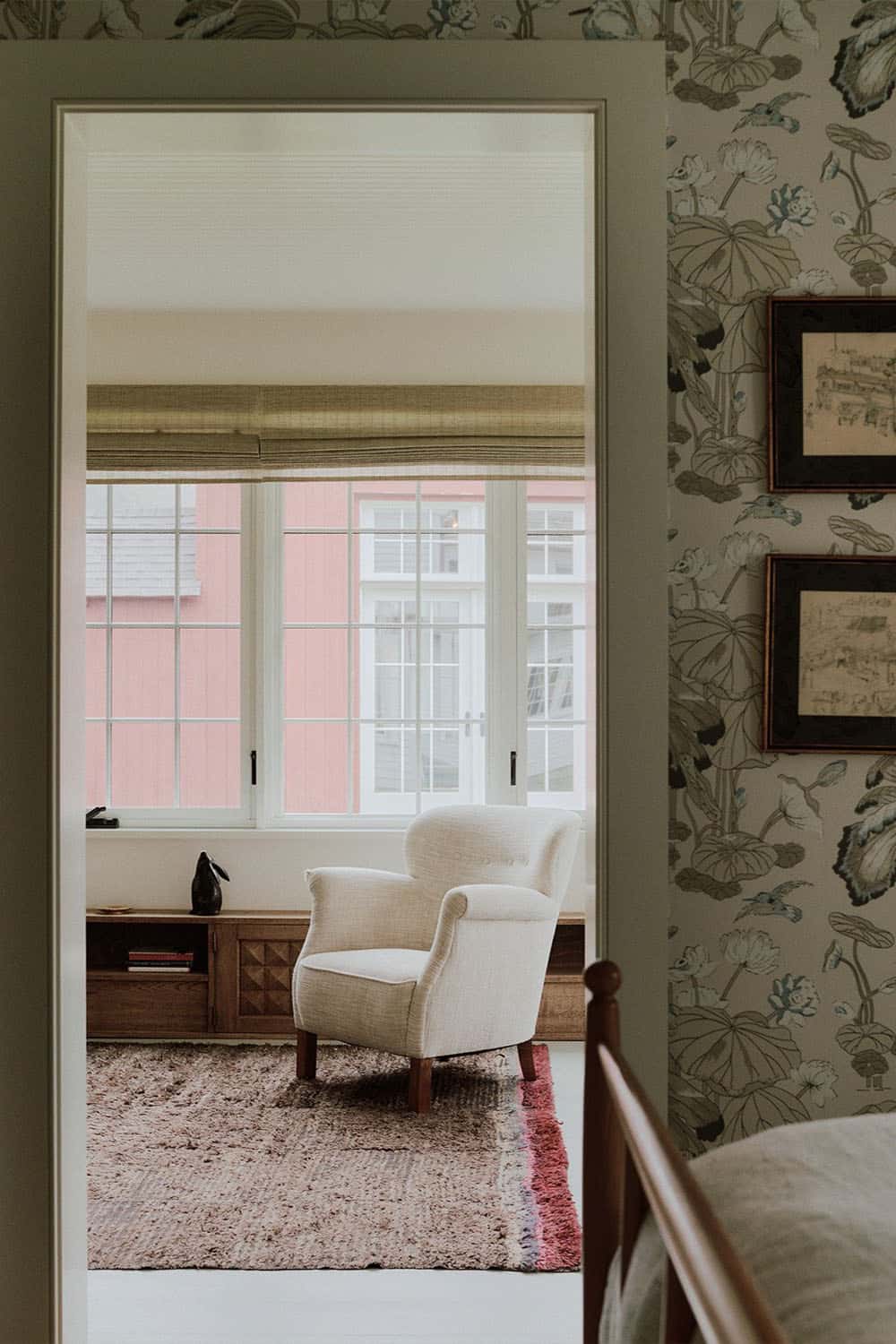 farmhouse style bedroom with a sitting room