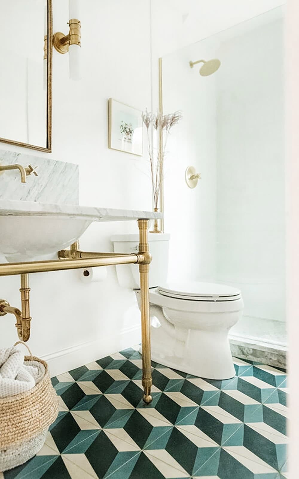 transitional stye bathroom with a vanity and patterned floor tile