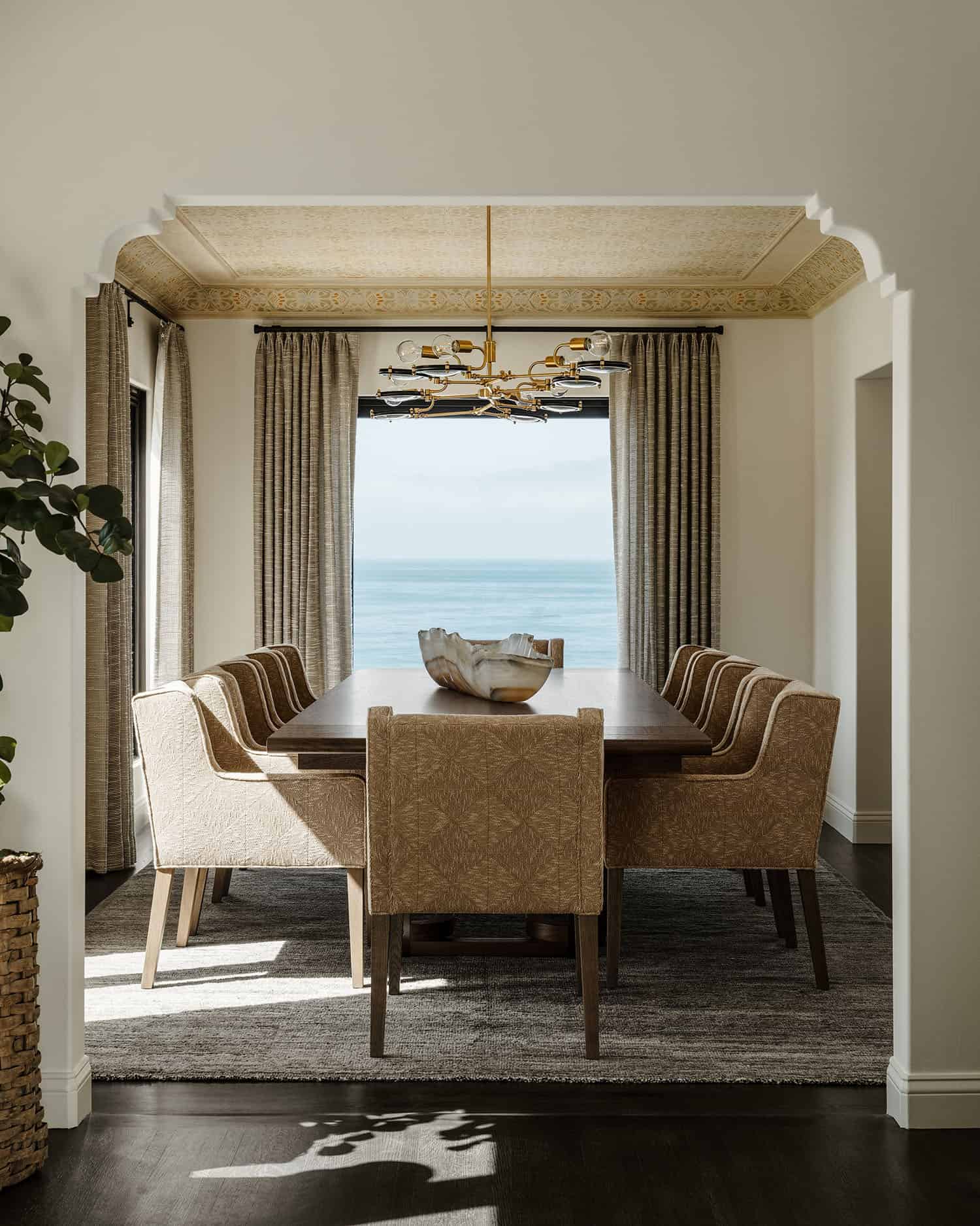 contemporary dining room with an ocean view