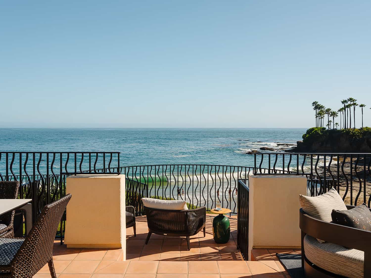 contemporary home patio with a view of the ocean