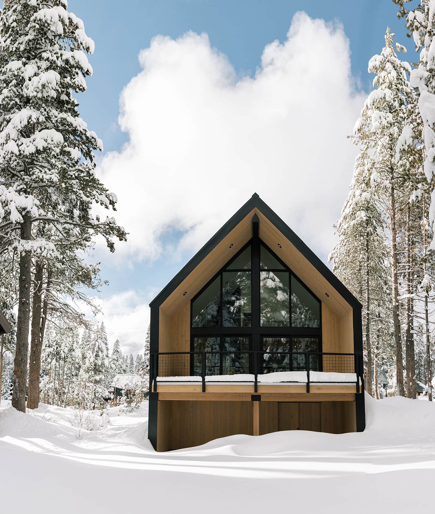 japandi style mountain house exterior with snow
