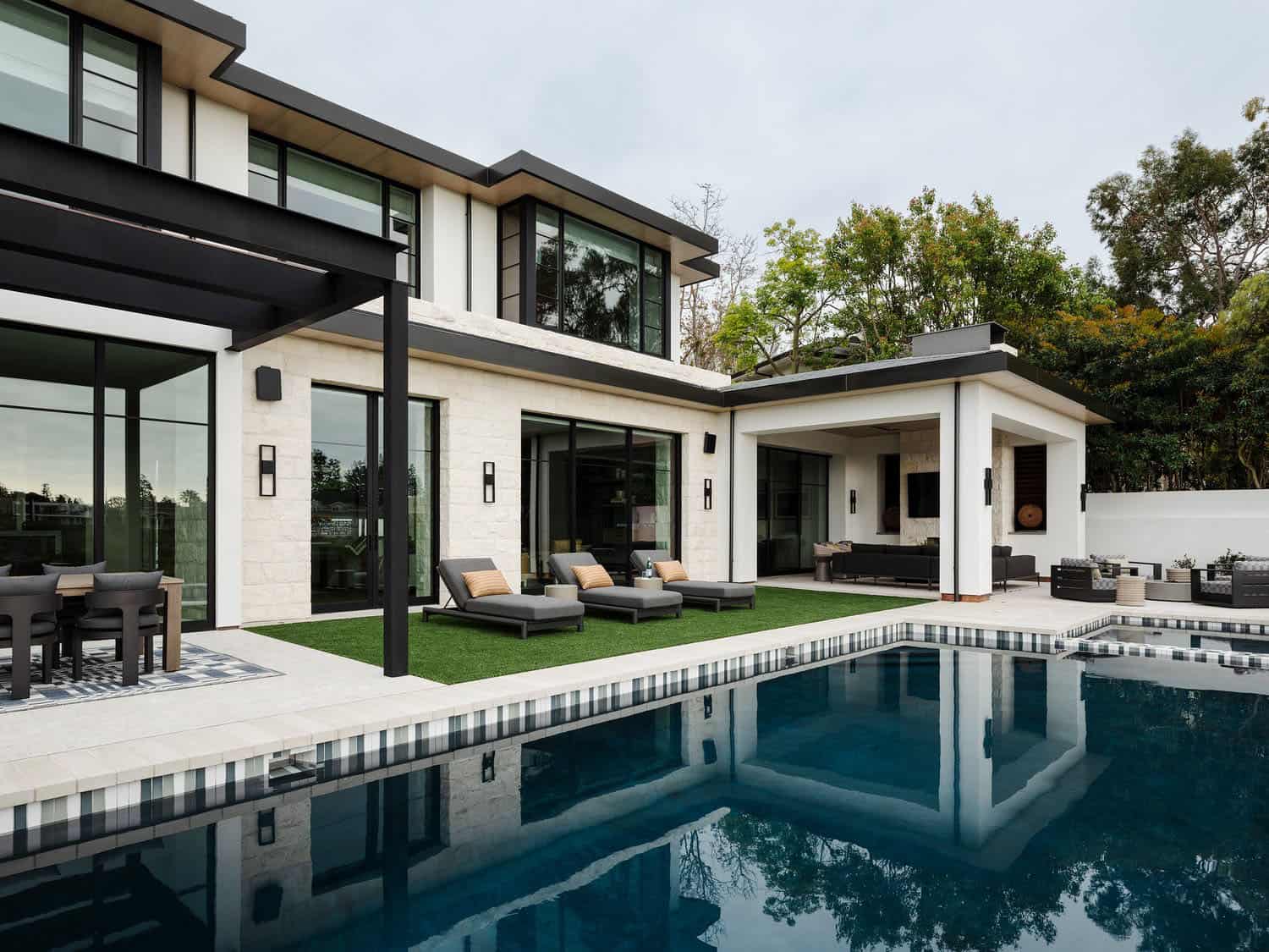 contemporary home exterior with a pool