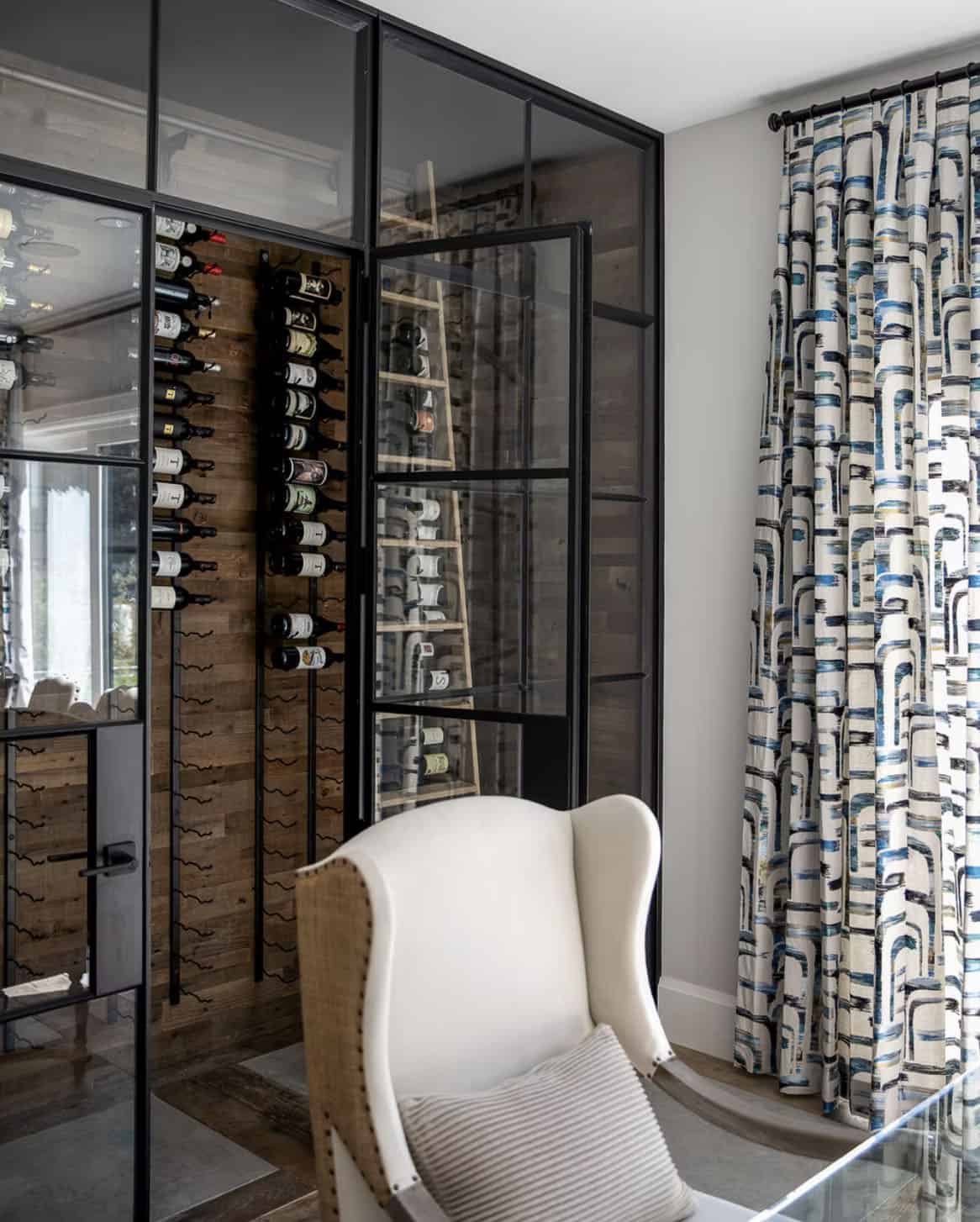 farmhouse style dining room with a wine cellar