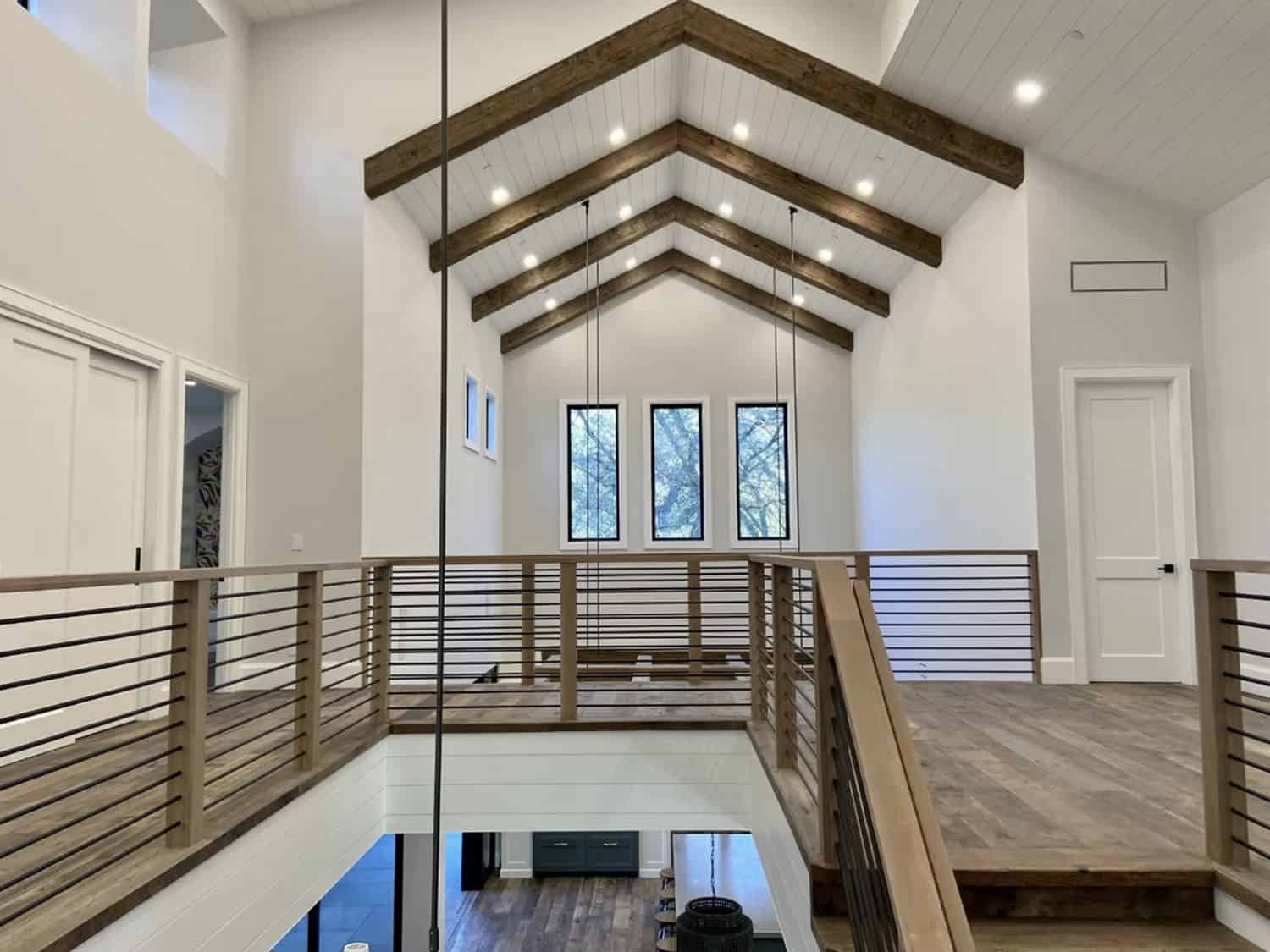 farmhouse style staircase upstairs landing