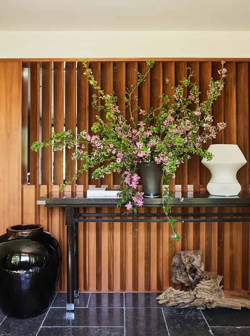 modern vineyard home entry with a console table