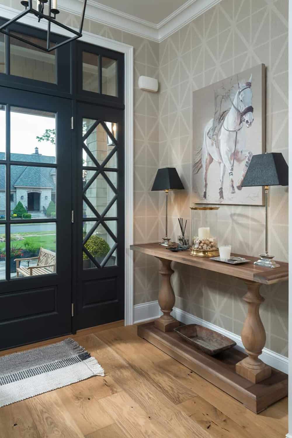 contemporary home entry with a console table