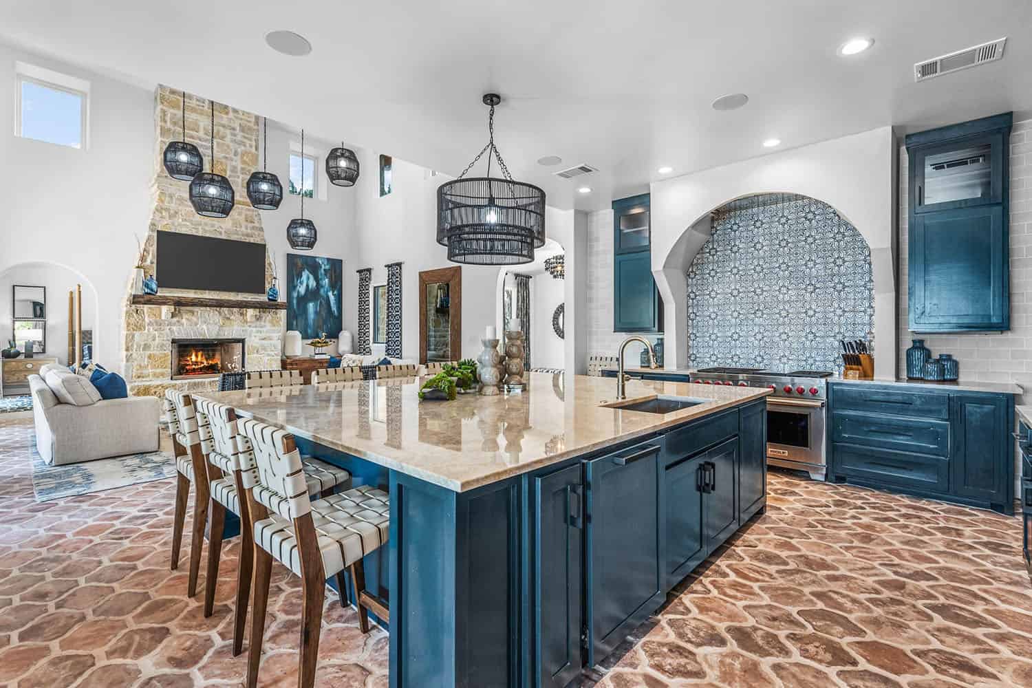 spanish-inspired kitchen with blue cabinets