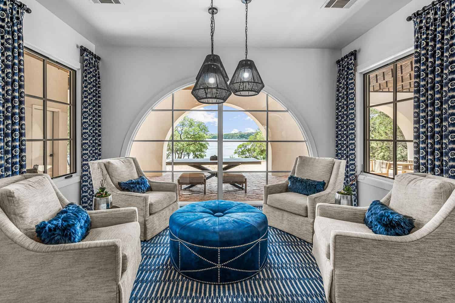 spanish-inspired living room with an arched window