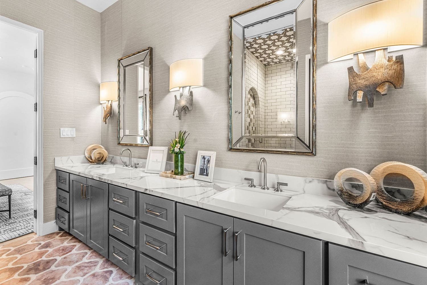 spanish-inspired bathroom with dual sinks