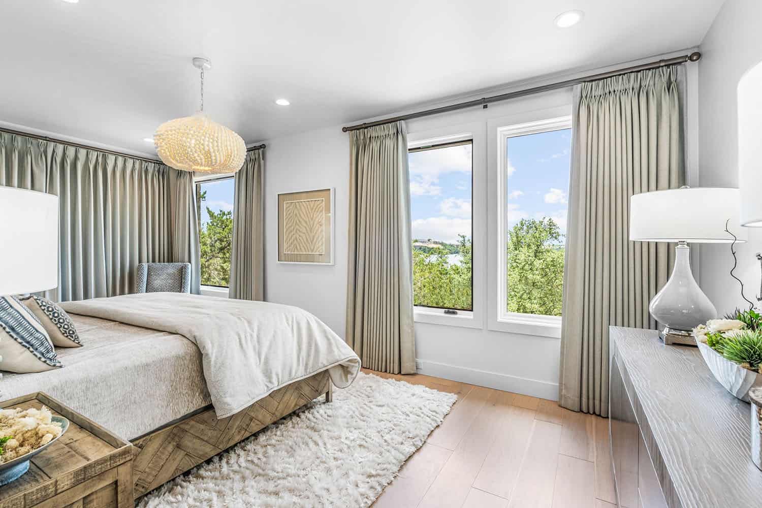 spanish-inspired bedroom with large windows