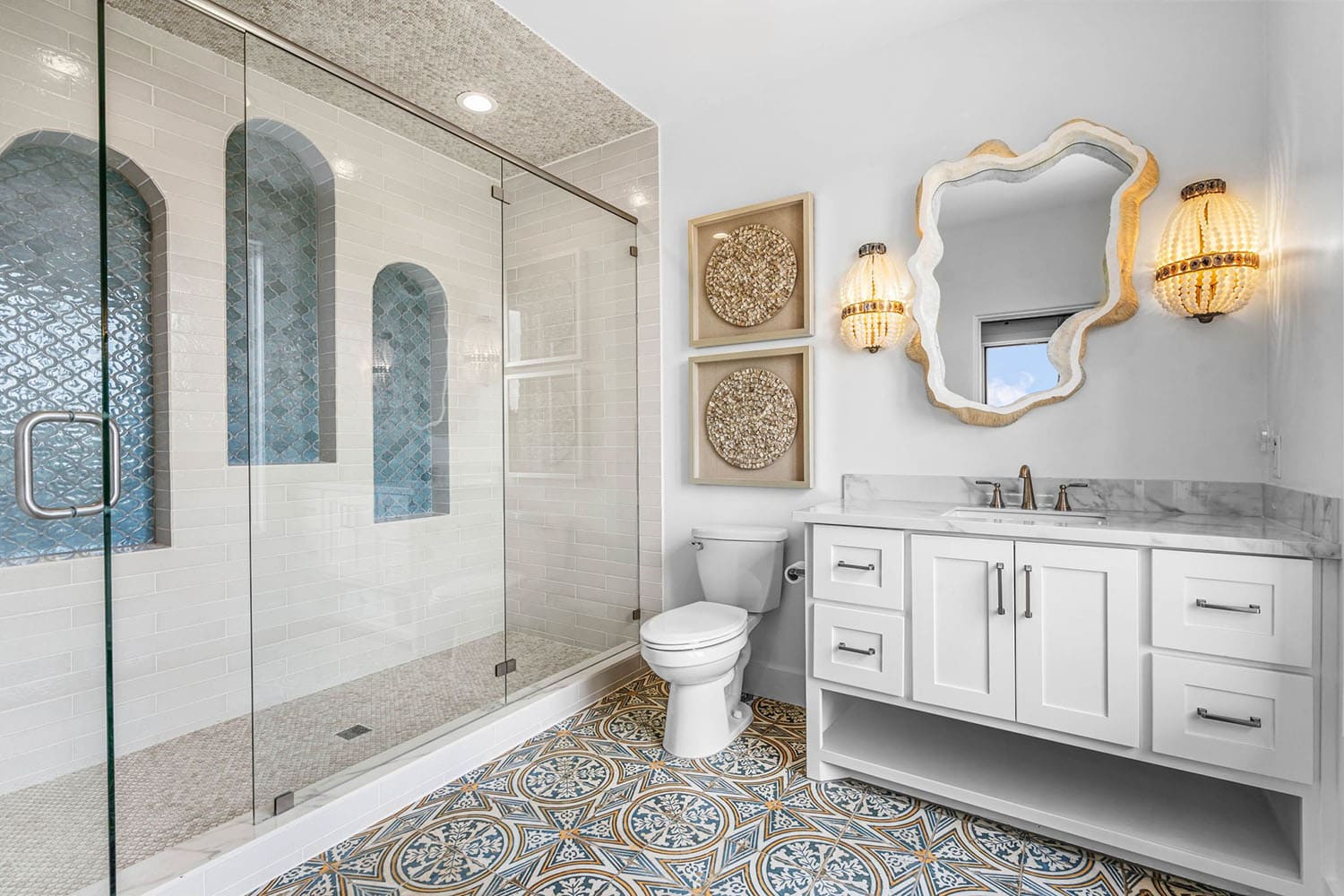 spanish-inspired bathroom with a large shower