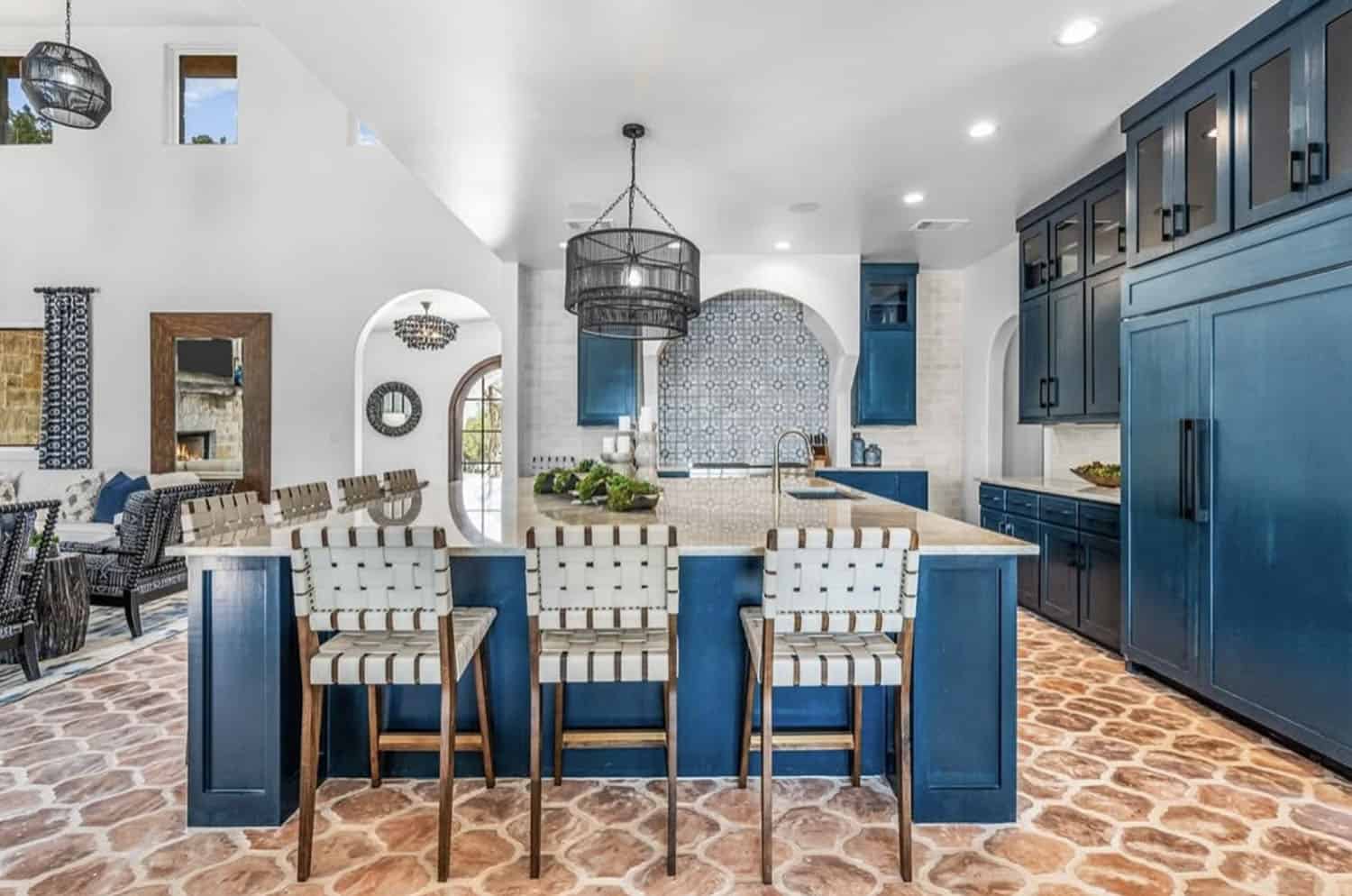 spanish-inspired kitchen with blue cabinets