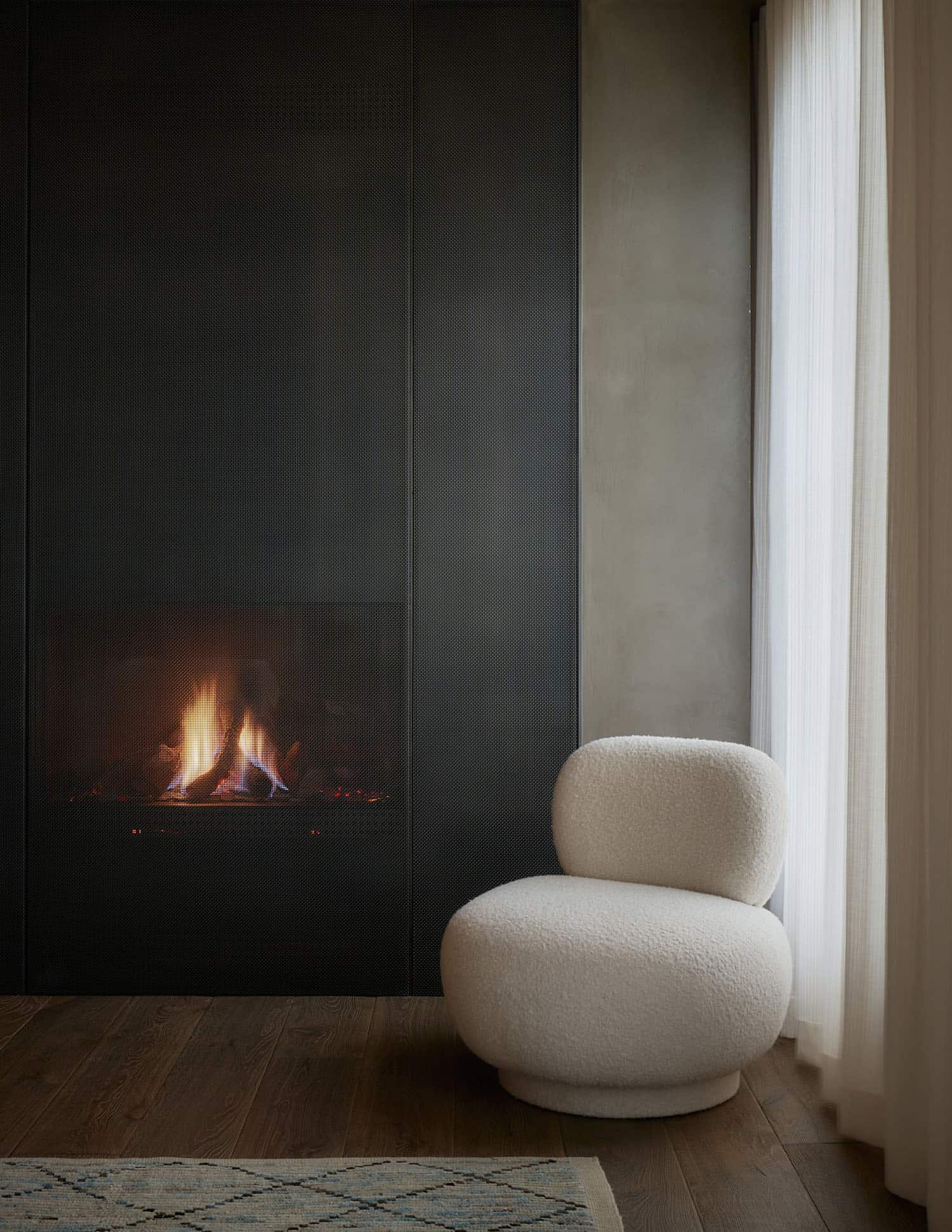 modern bedroom with a fireplace