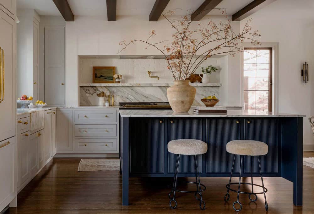 contemporary kitchen with a blue painted island