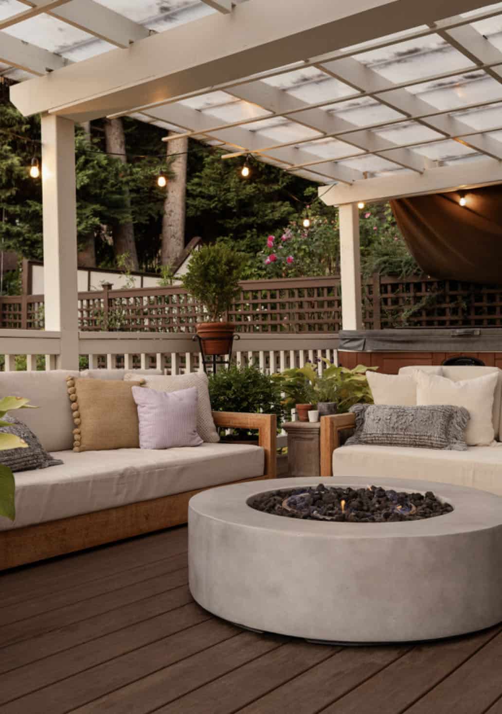 contemporary pergola-covered patio with outdoor furniture and a fire pit