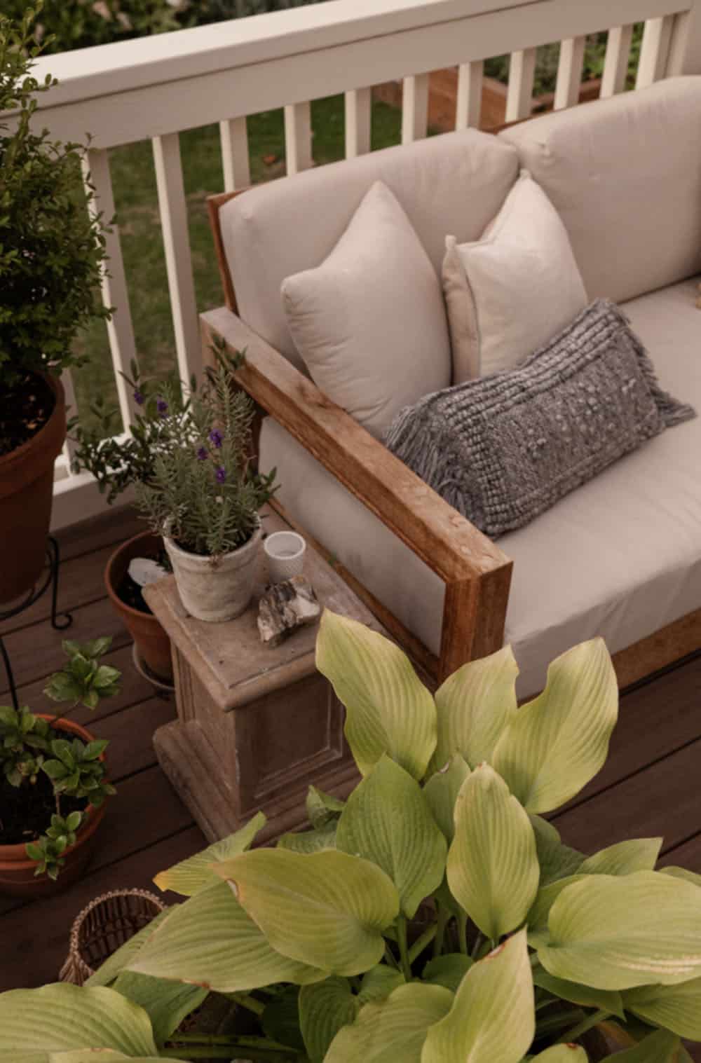 contemporary pergola-covered patio sofa detail