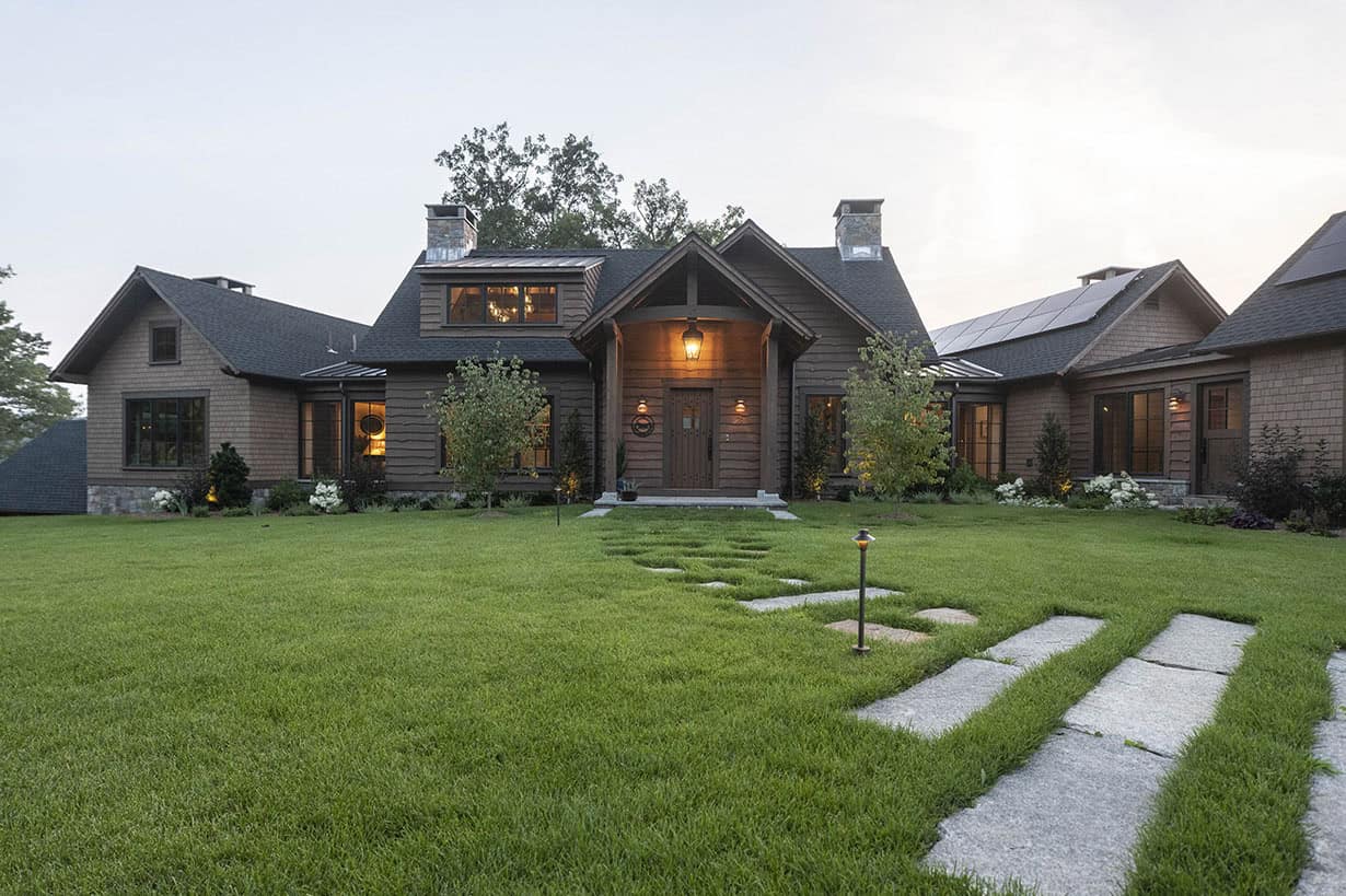 rustic house exterior with grass landscape