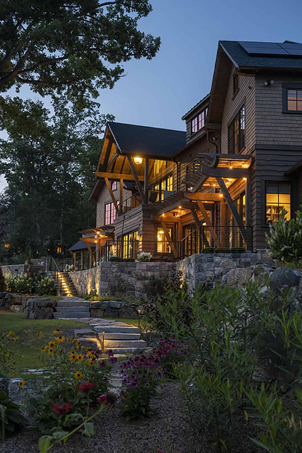 rustic house exterior backyard view at dusk