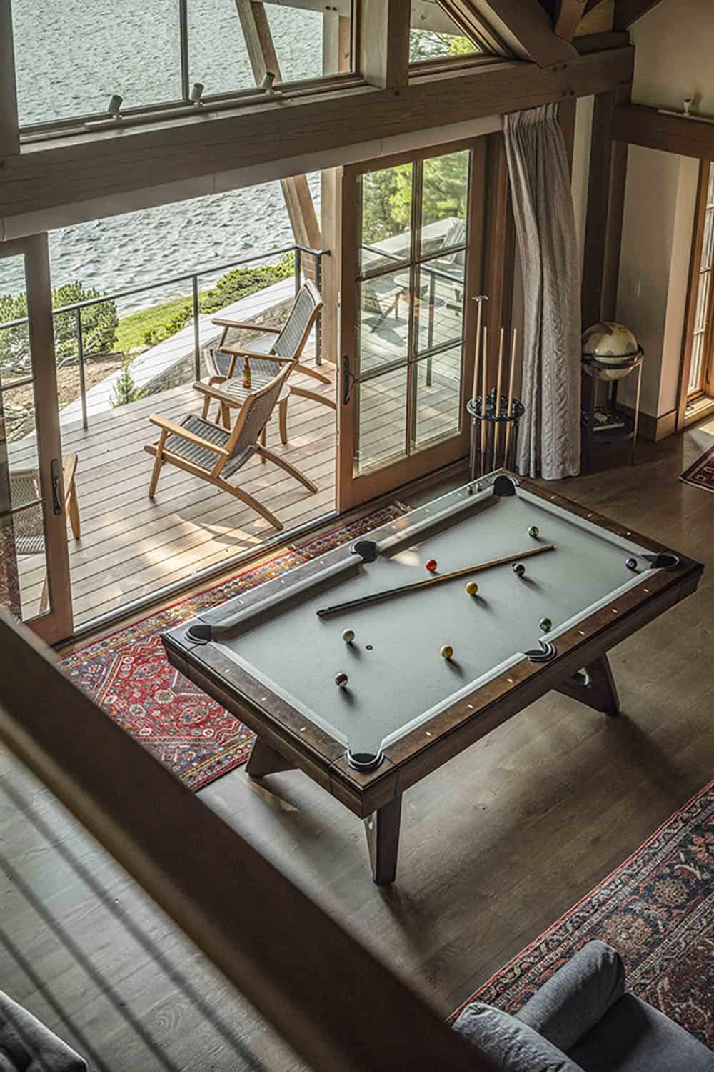 rustic family room with a billiard table