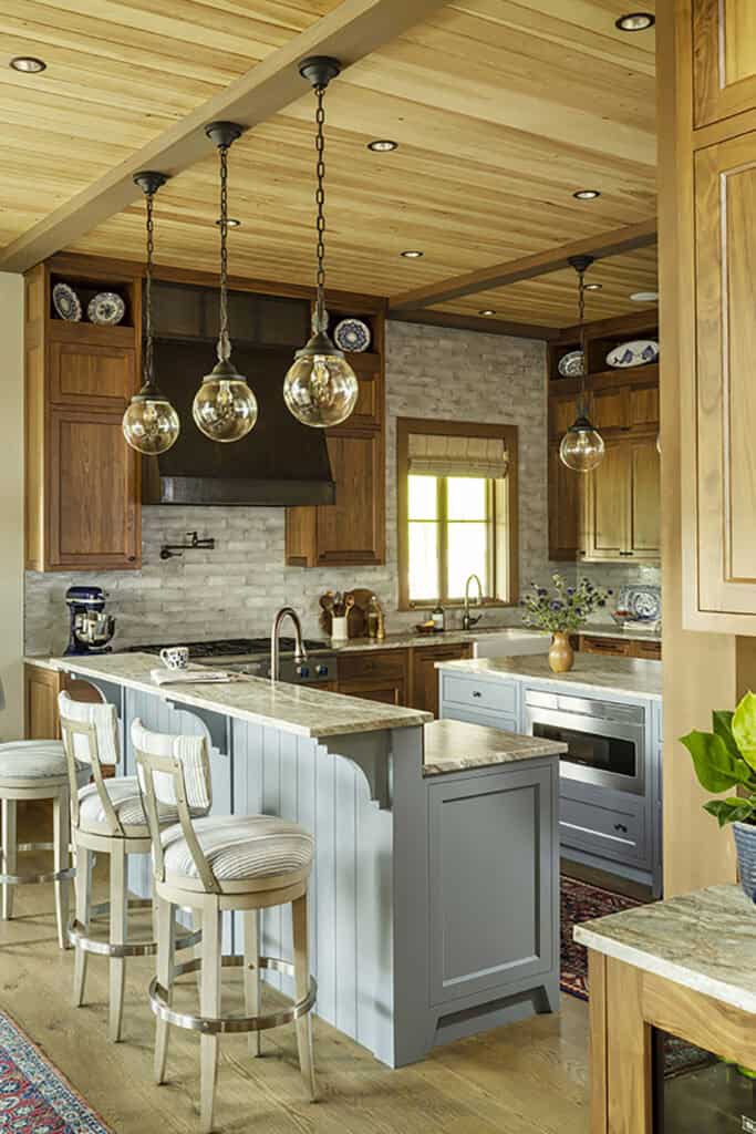 Adirondack-inspired home in New England celebrates serene lakeside views
