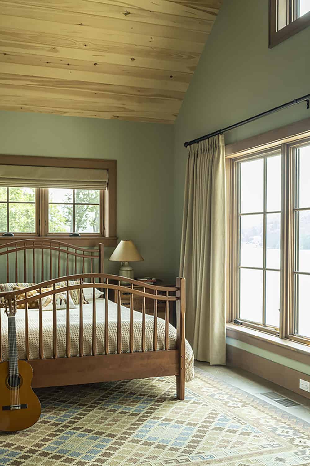 rustic bedroom with a large window