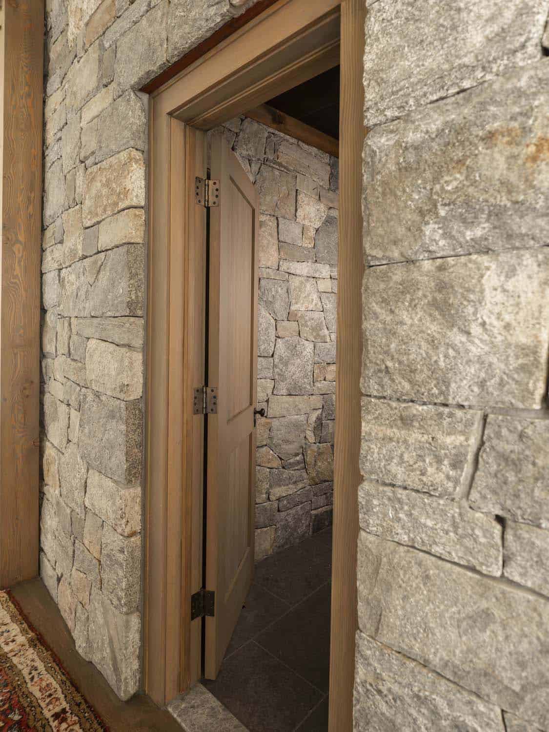 rustic hallway with a door