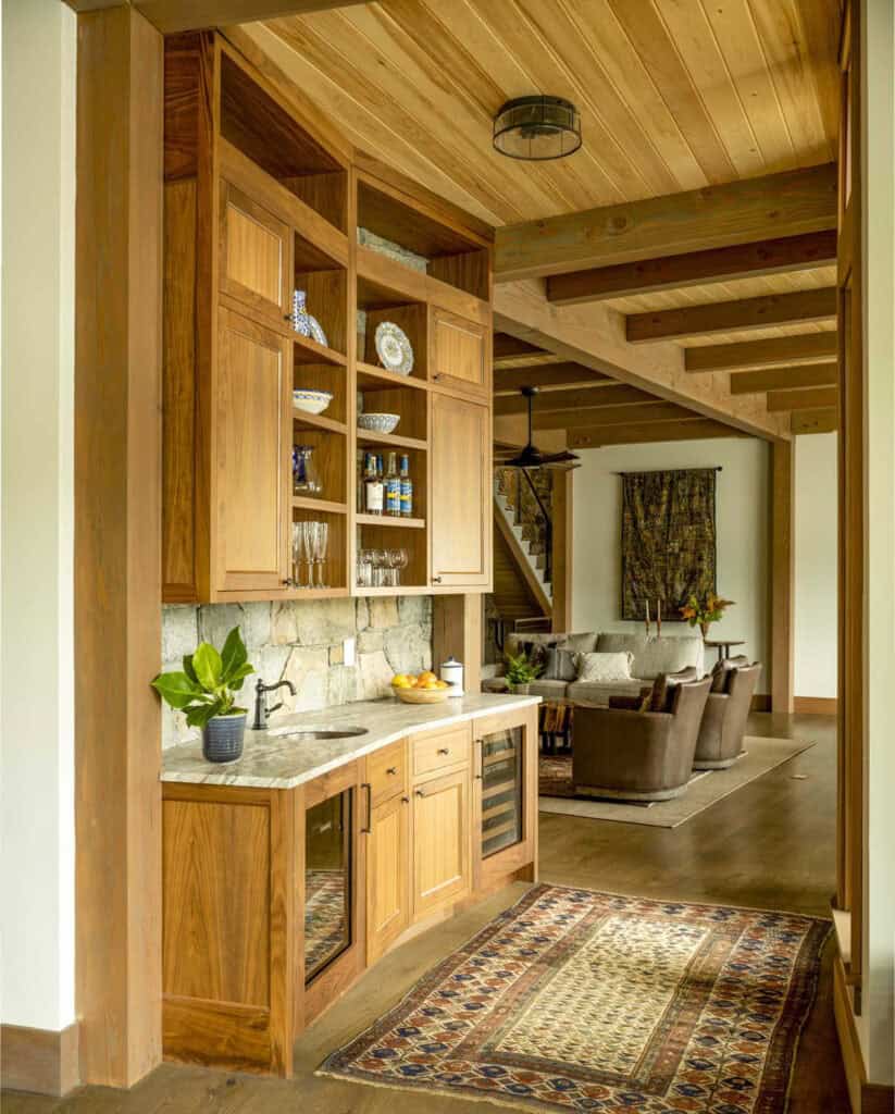 Adirondack-inspired home in New England celebrates serene lakeside views