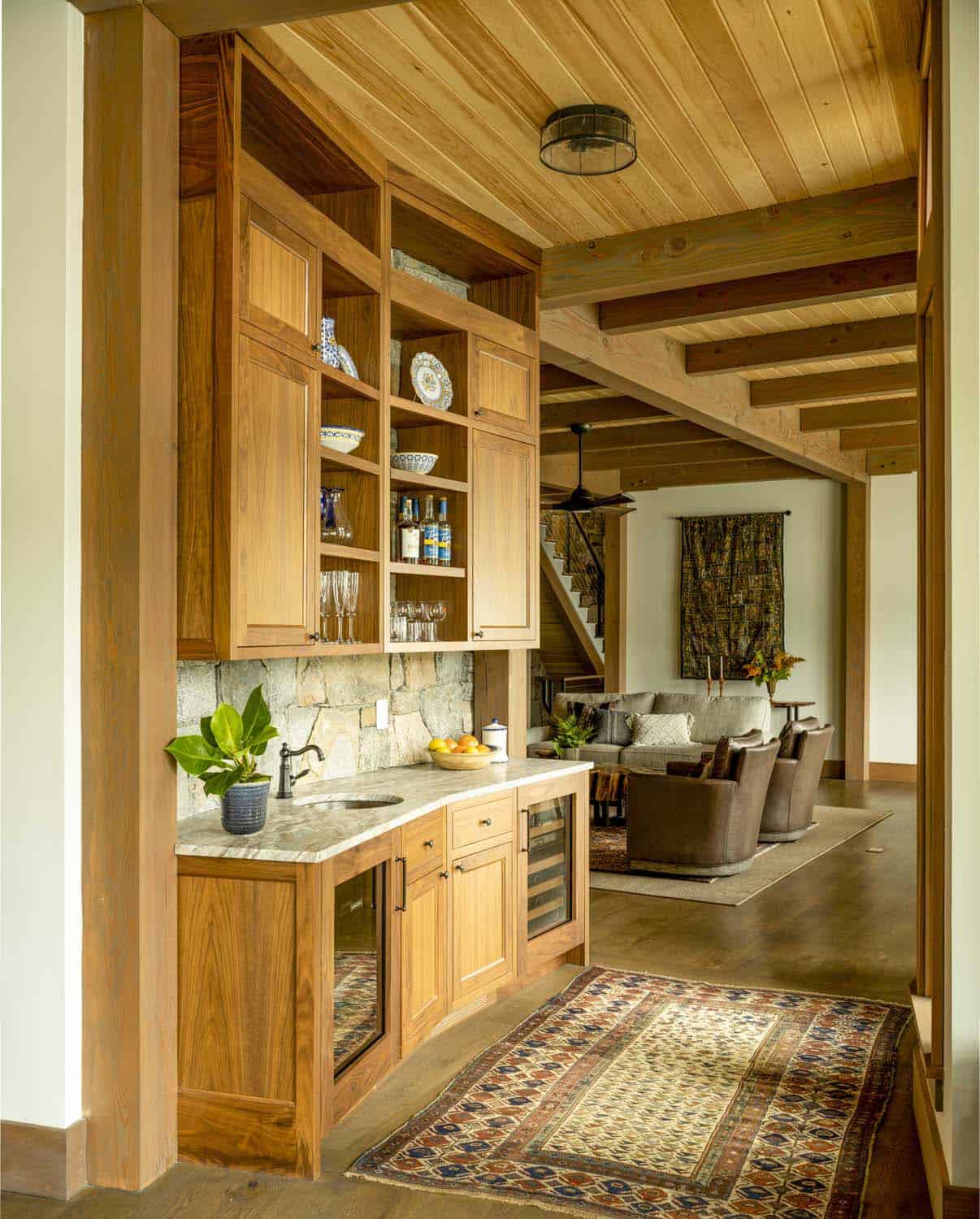 rustic kitchen with built-in cabinets and wet bar