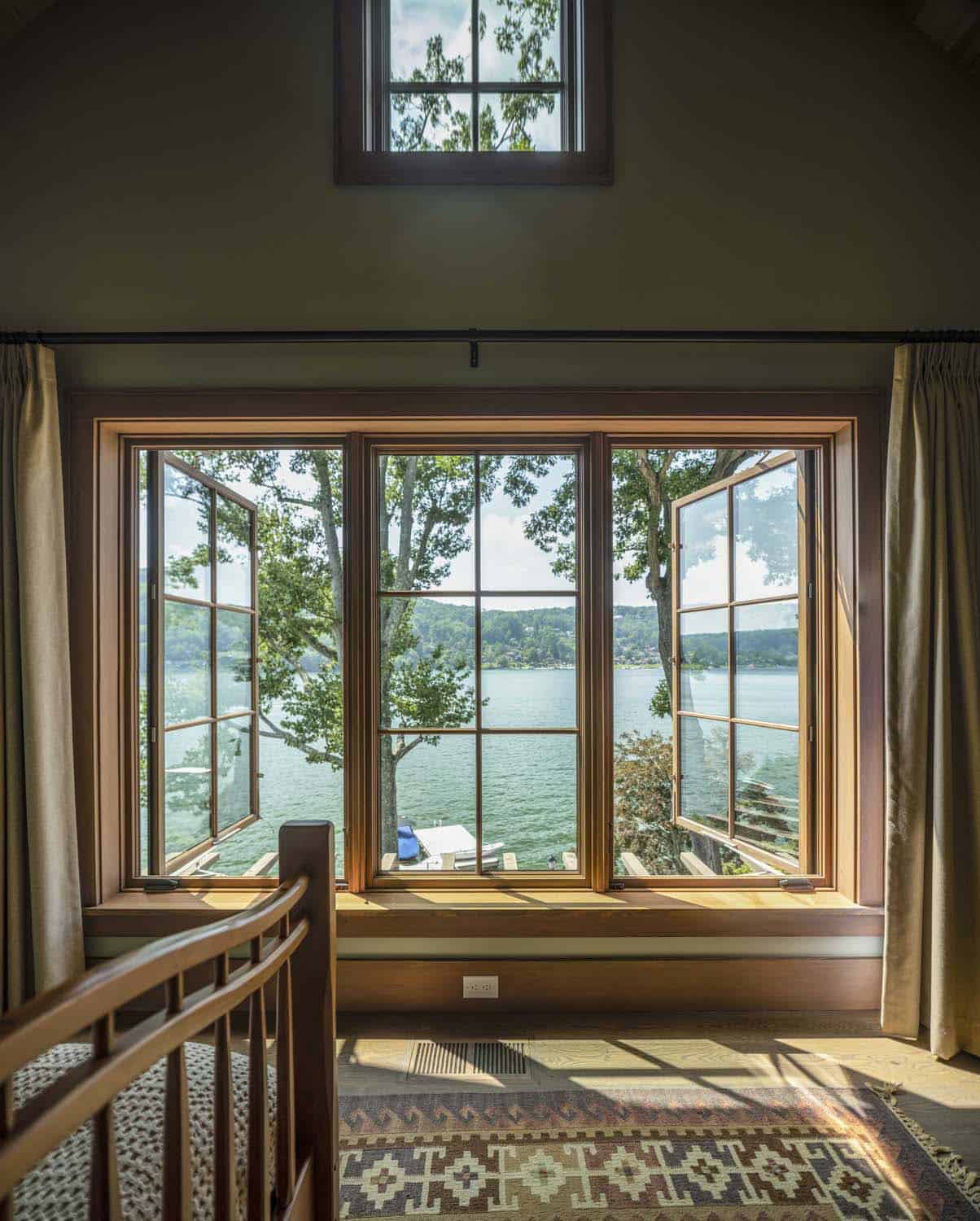 rustic bedroom with a large window