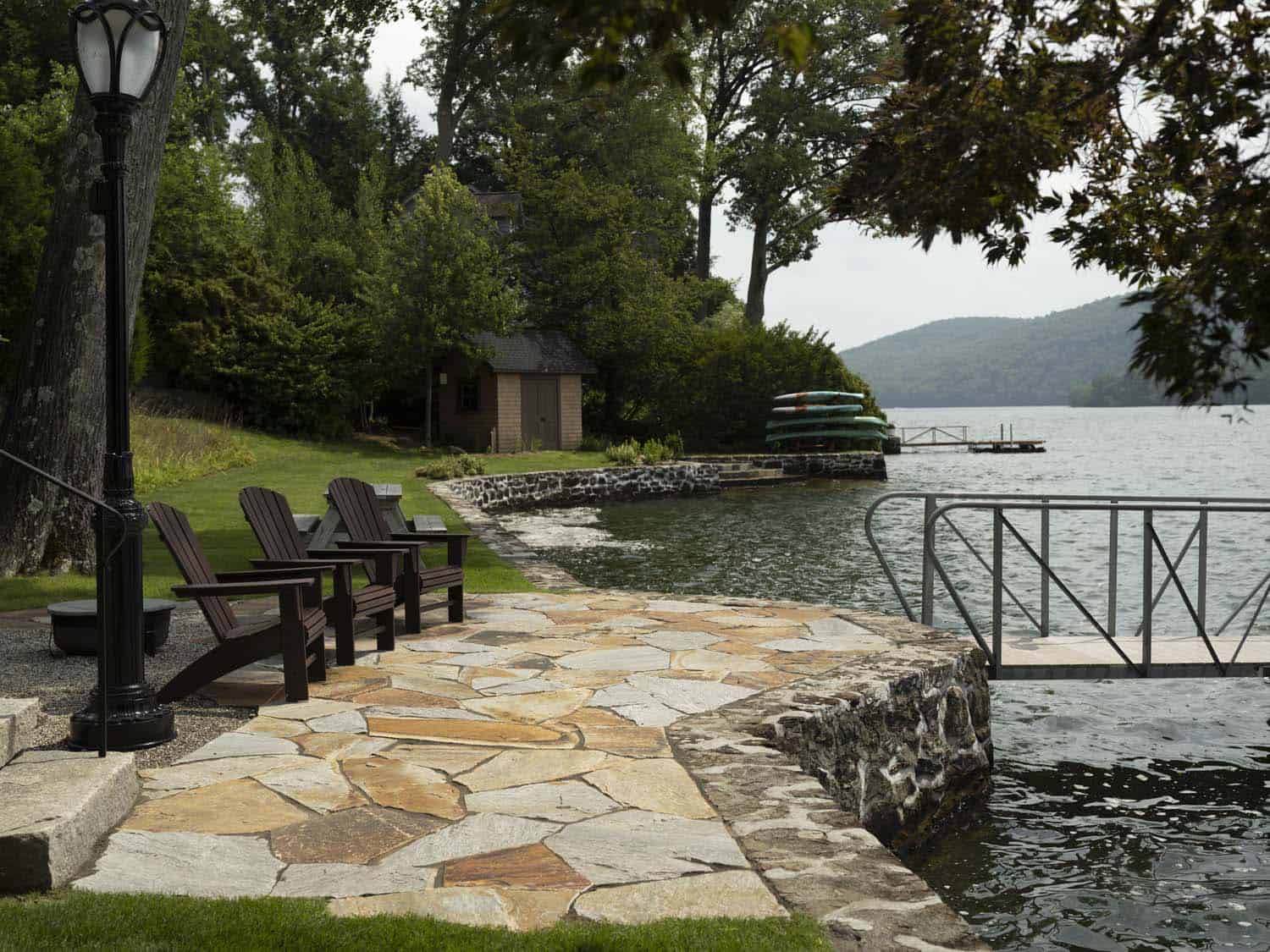 rustic lake house waterfront view and boat dock