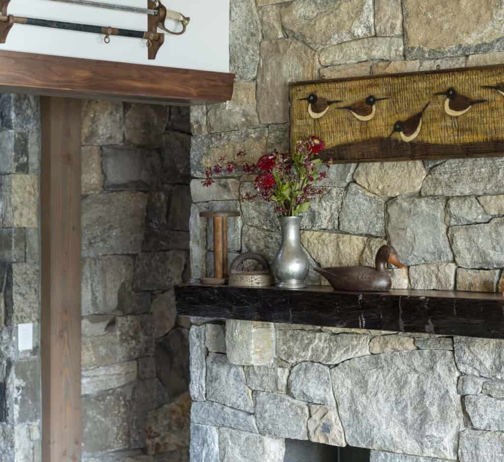 Adirondack-inspired home in New England celebrates serene lakeside views