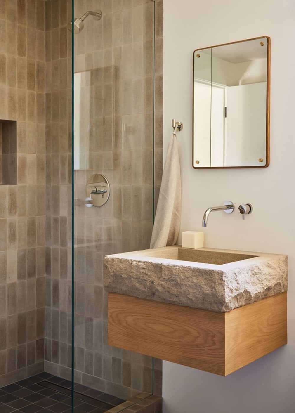 bathroom with a stone sink