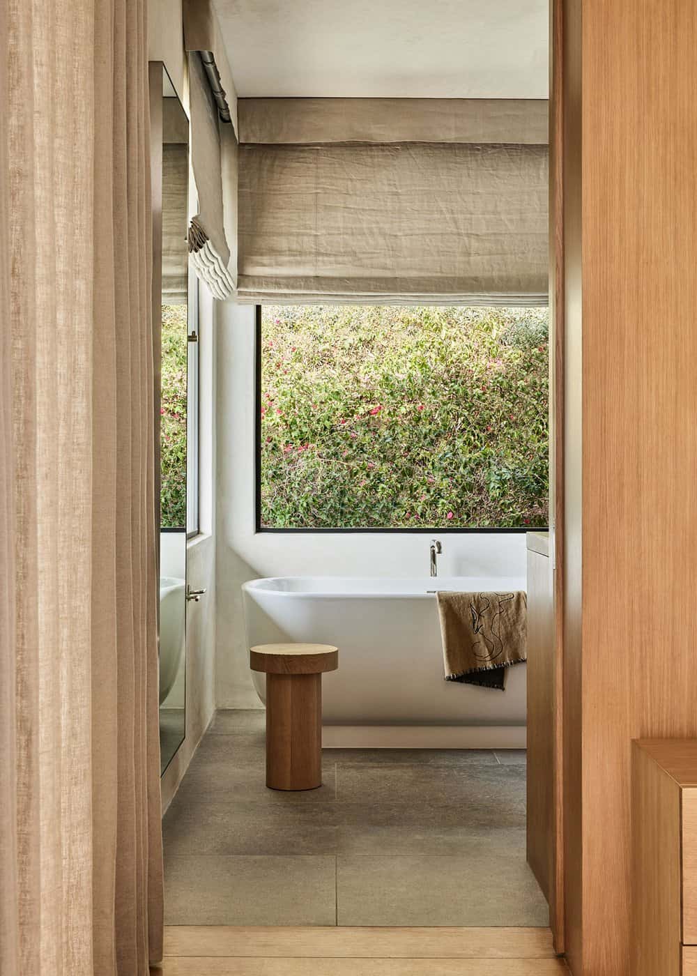 neutral bathroom with white tub