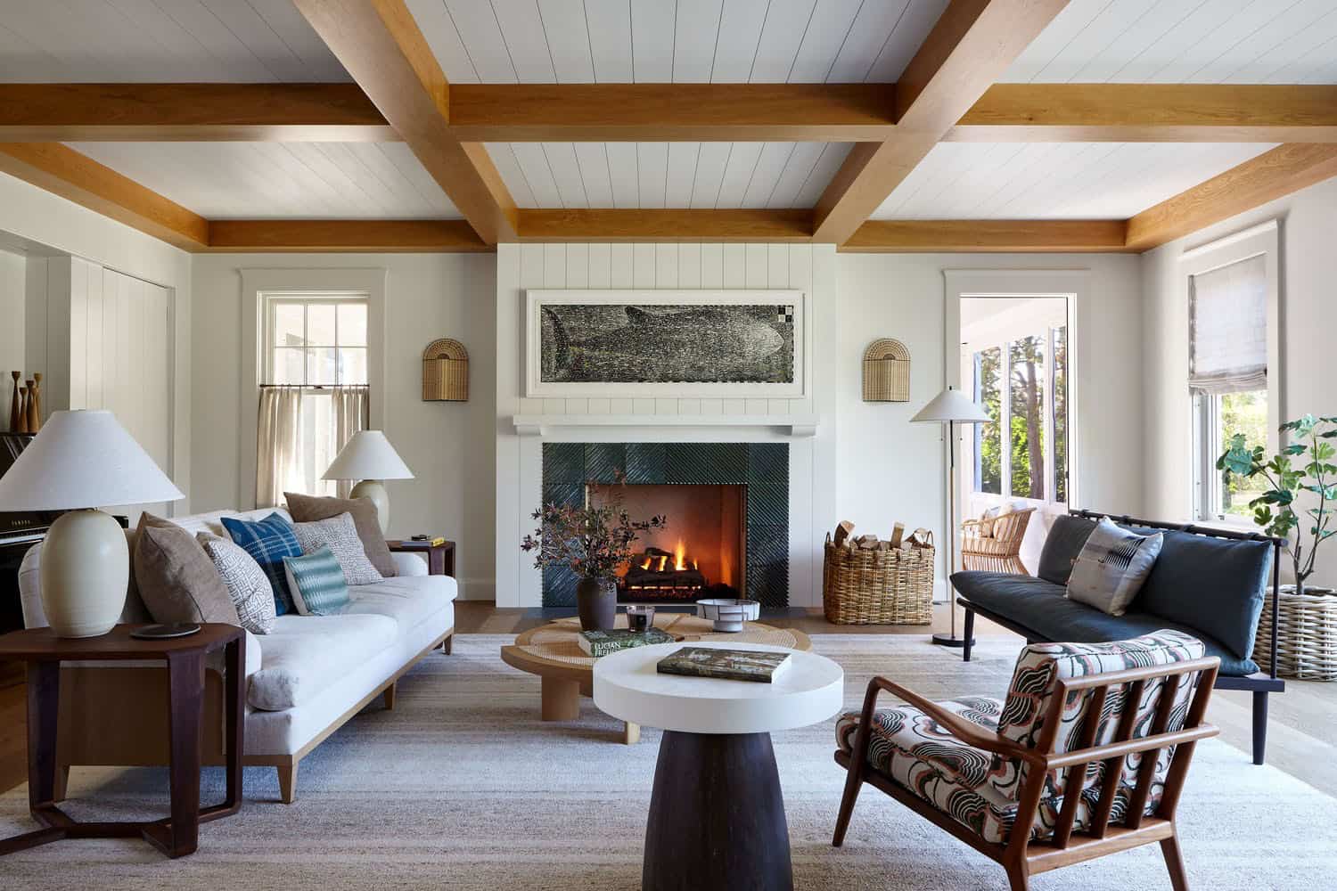 beach style living room with a fireplace