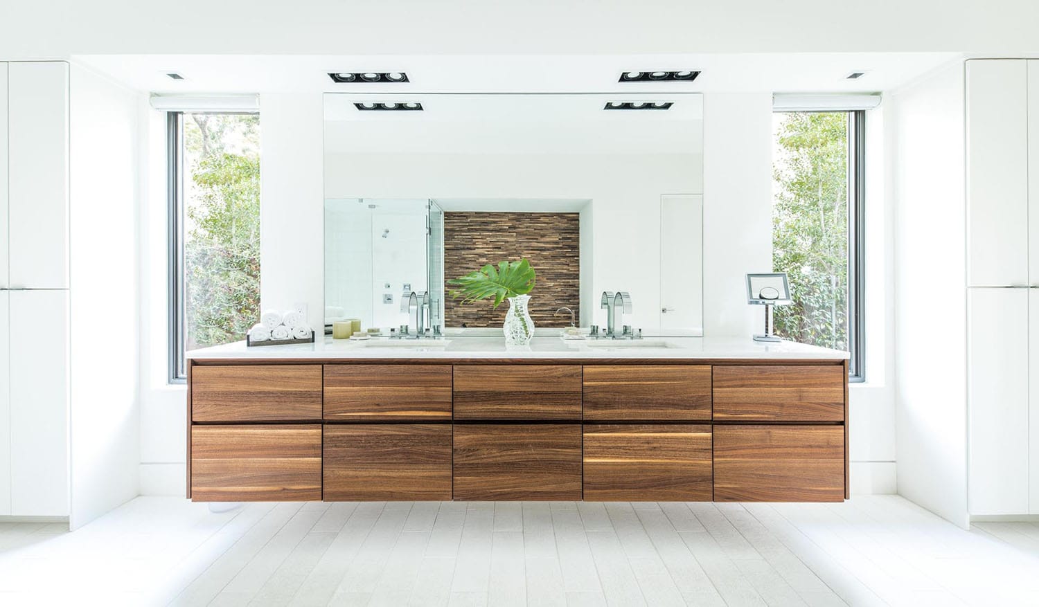 contemporary bathroom with a dual vanity