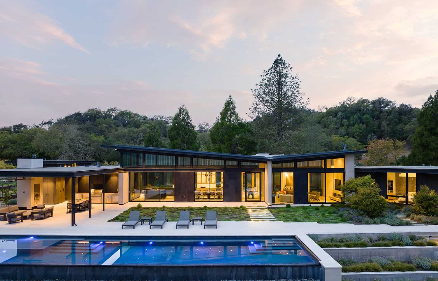 contemporary home exterior with a pool