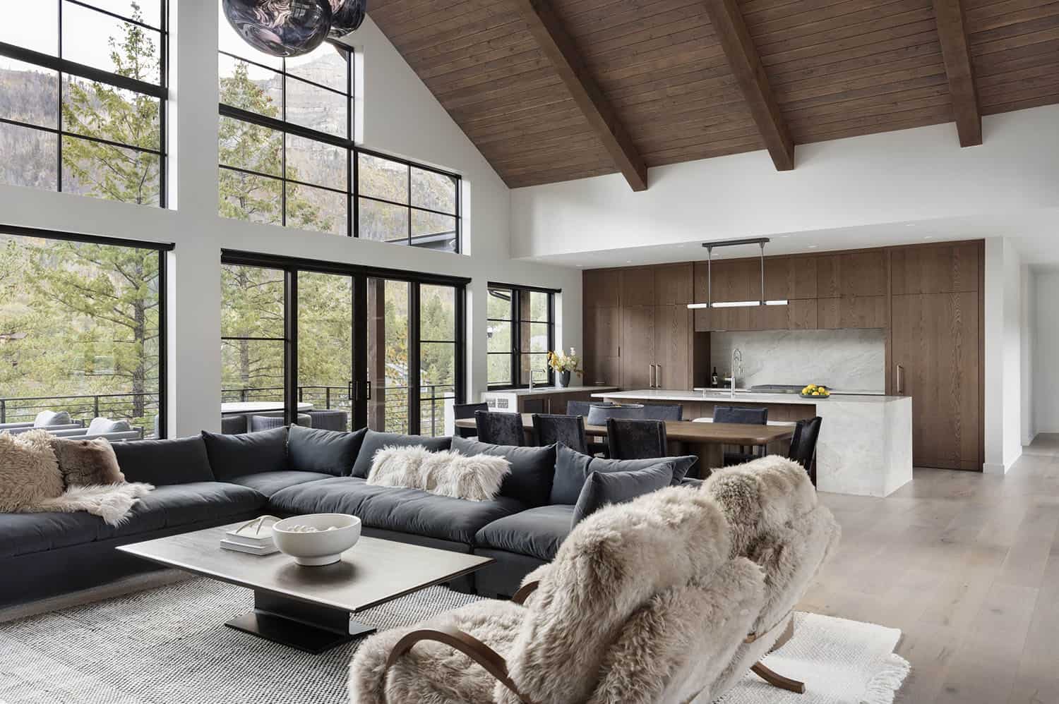 modern rustic living room looking into the kitchen