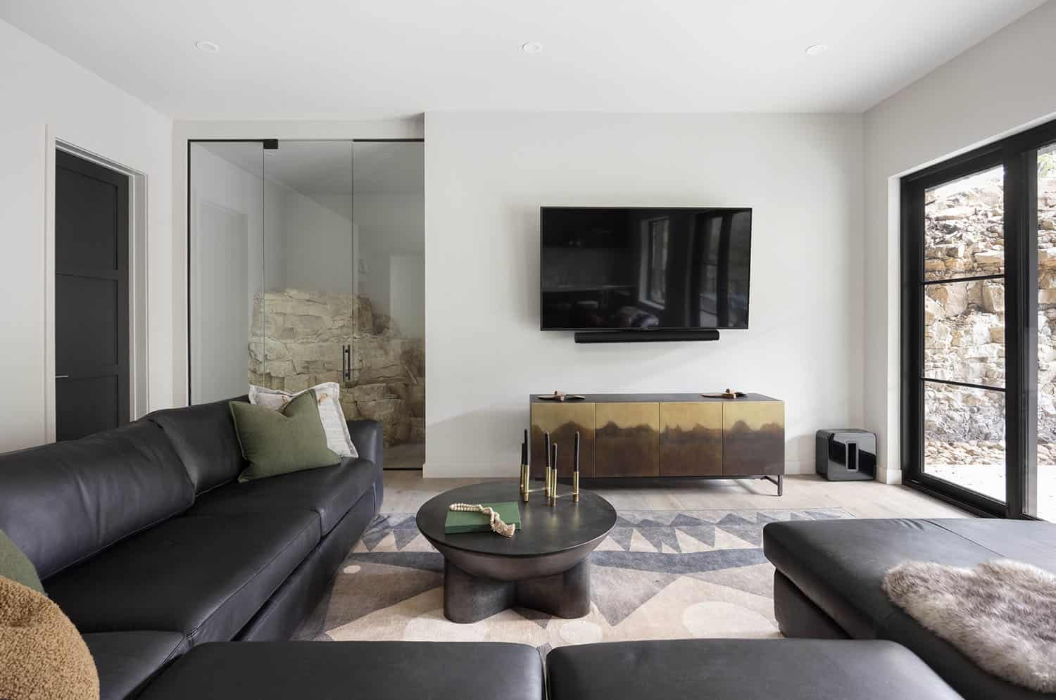 modern rustic family room with a TV wall