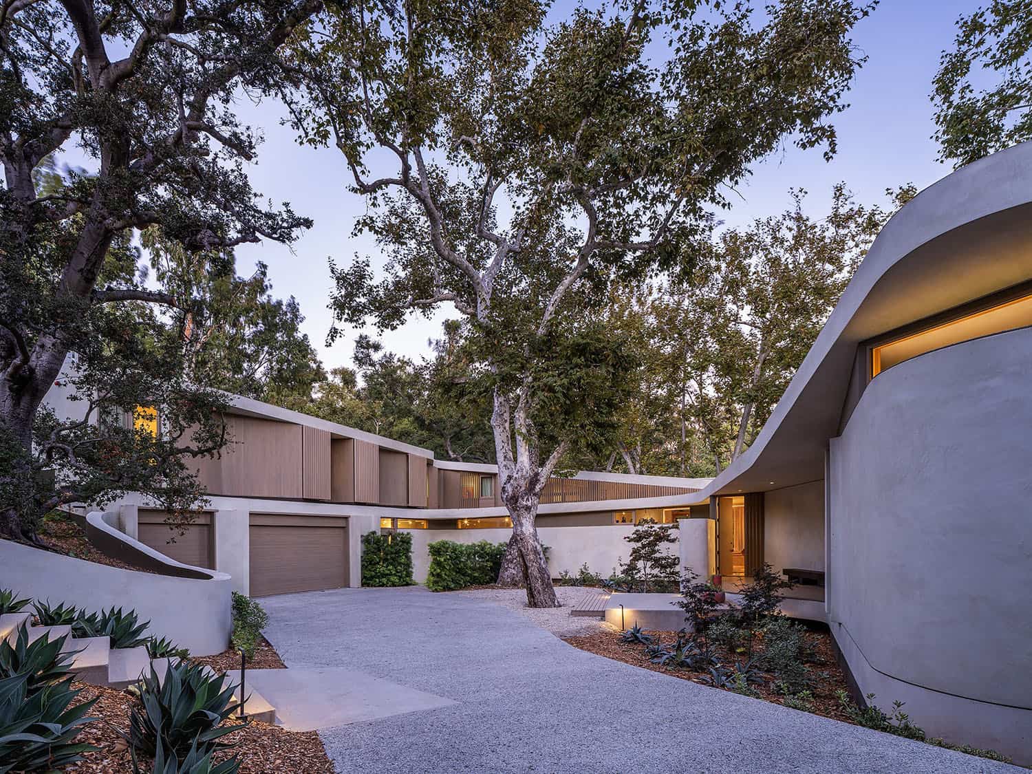 modern organic home exterior at dusk