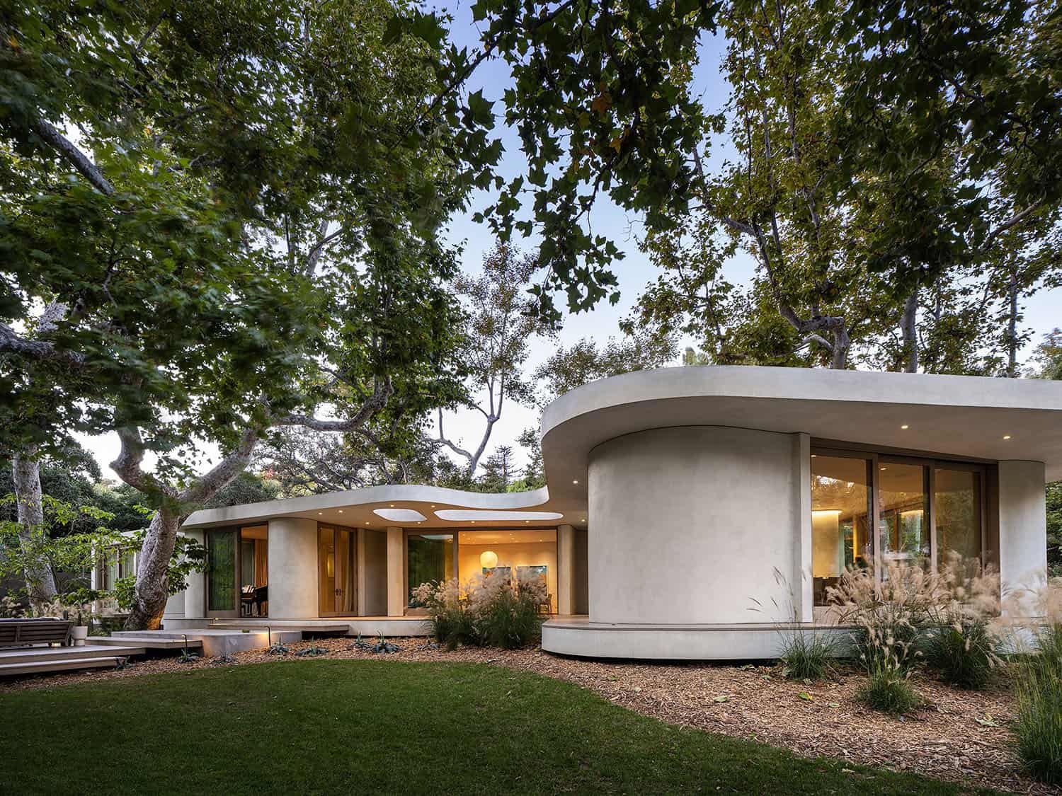 modern organic home exterior at dusk