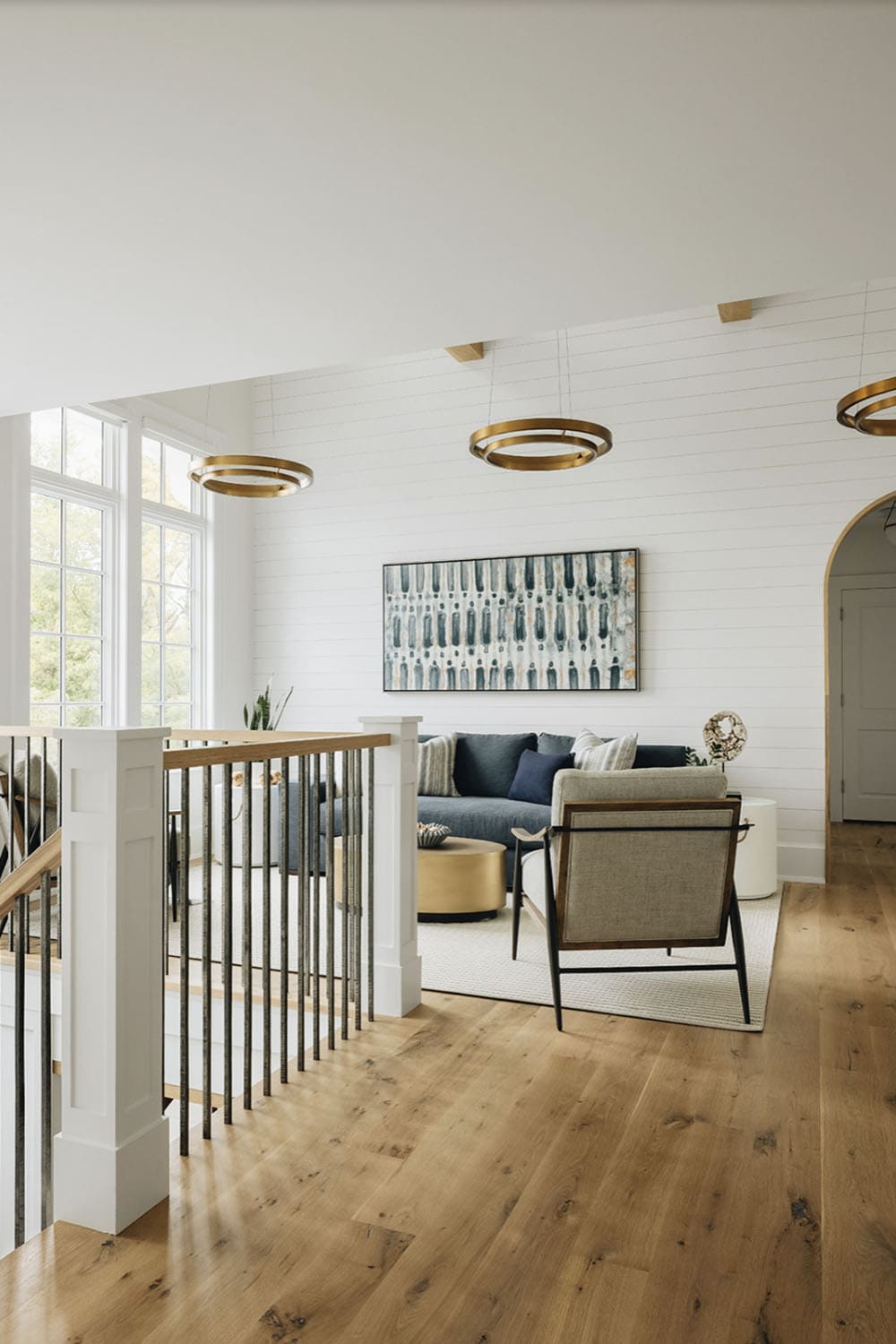 transitional upstairs landing with a sitting area