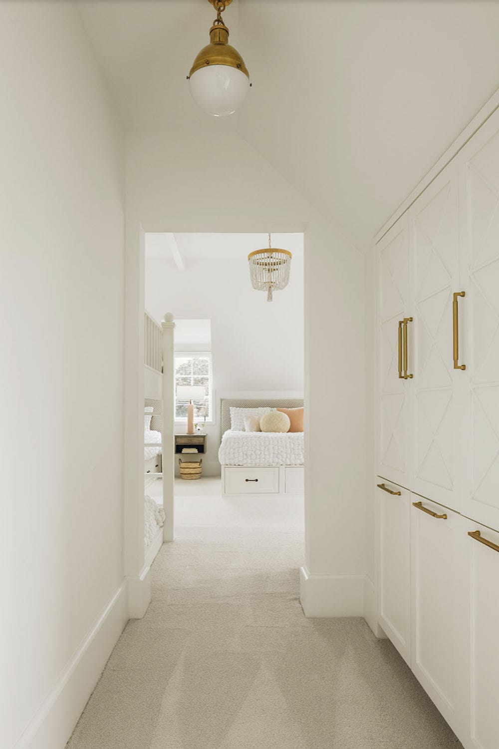 transitional hallway with a closet