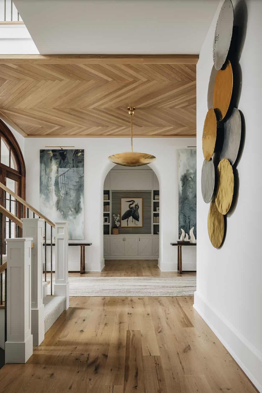 transitional home entry with console tables